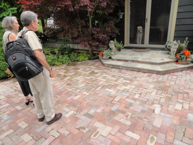 Beverly and Al admire the Hillmans recently-completed flagstone stoop.